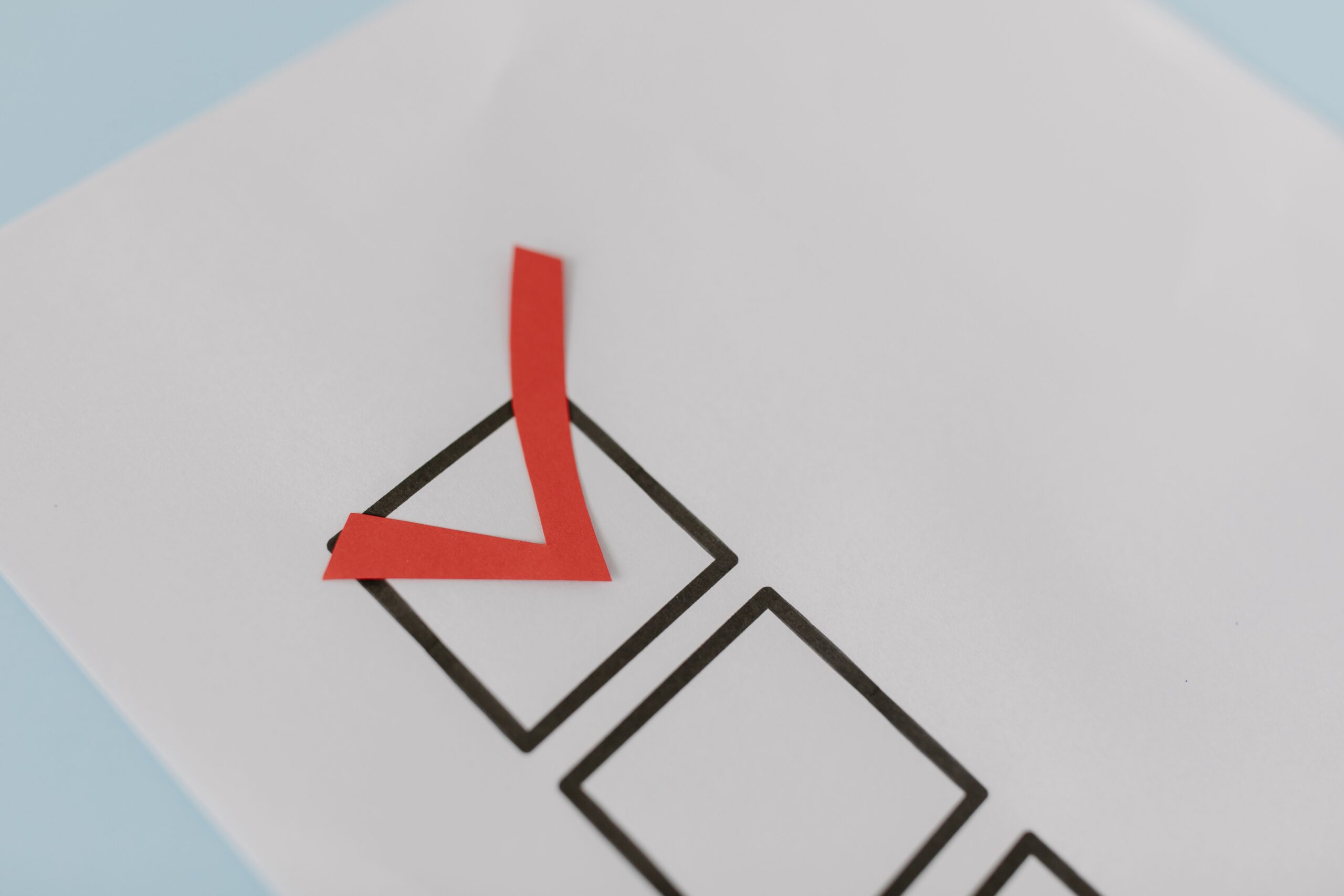 a red checkmark on a list
